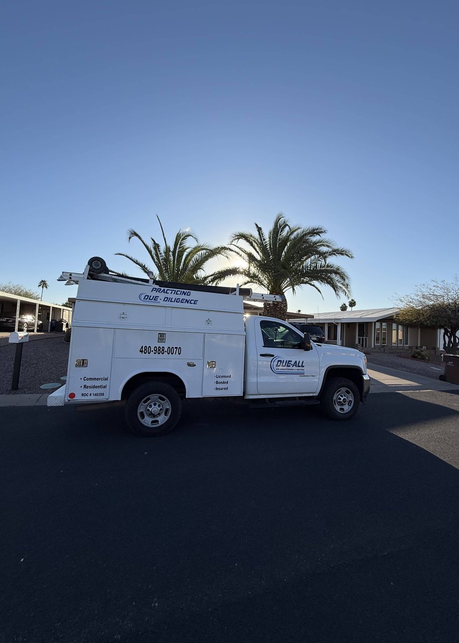 Due-All Air Conditioning & Heating service truck parked on site