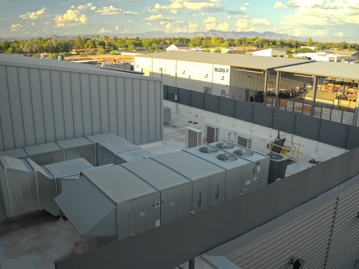 Rooftop ductwork and air handlers on an East Valley commercial building