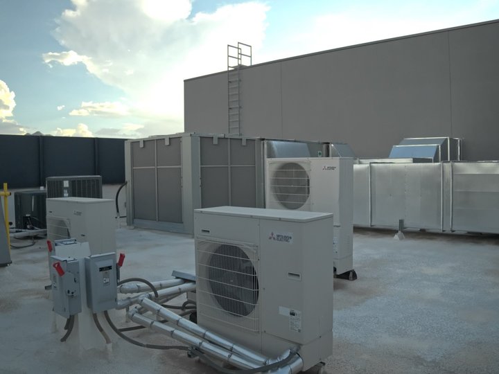 Mini split and package units on a commercial rooftop