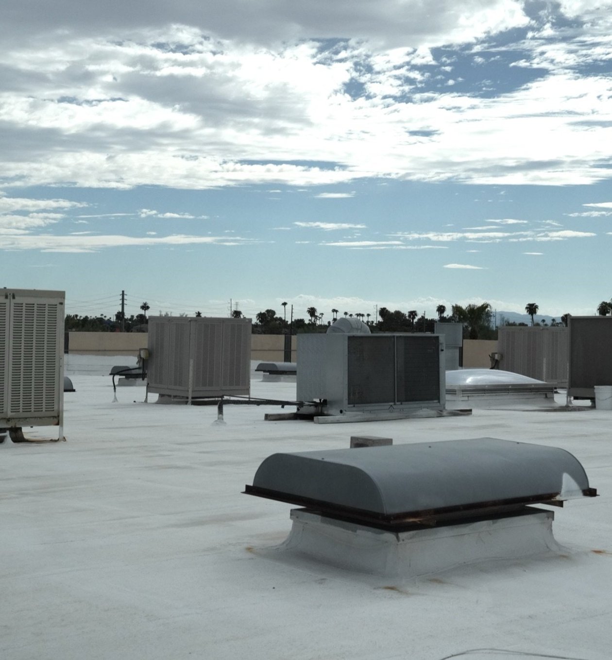Roof mounted commercial swamp coolers on an East Valley building