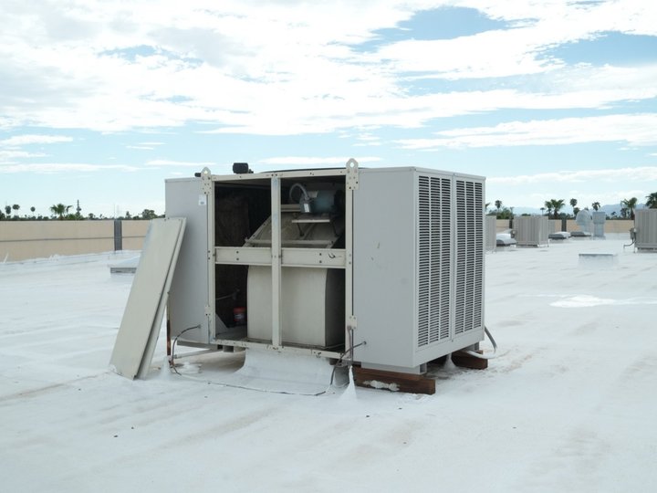 Commercial swamp cooler with the cabinet open for service